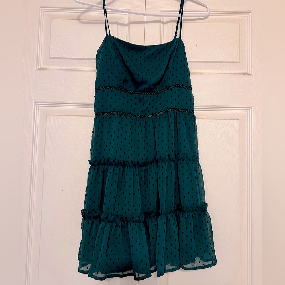 Francesca’s green polka dot mini dress